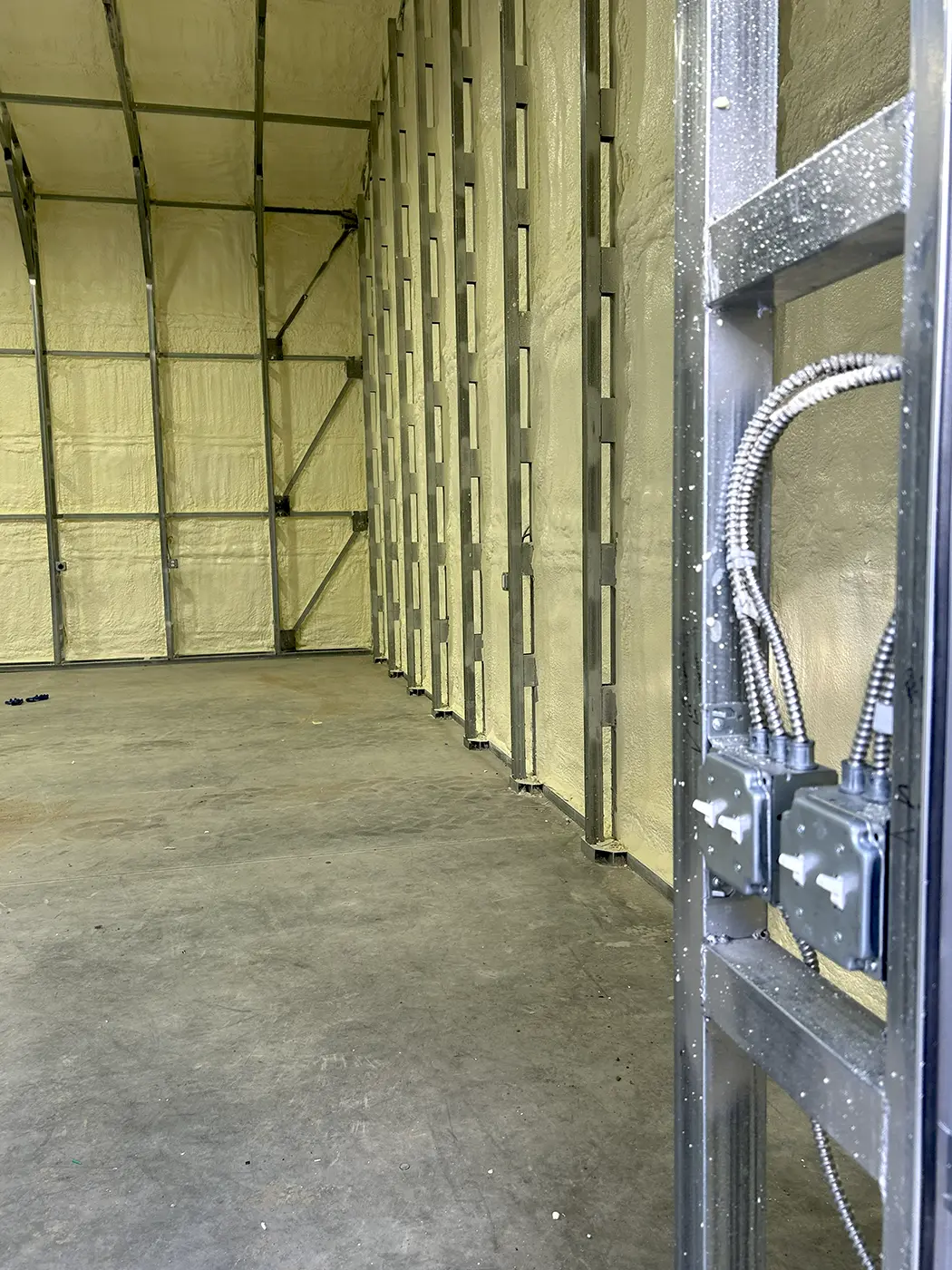 Commercial electrical rough-in installation inside a new construction building by Camson Electric in Utah